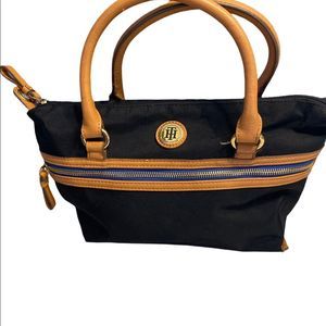 Tommy Hilfiger hand bag in Black and Tan color